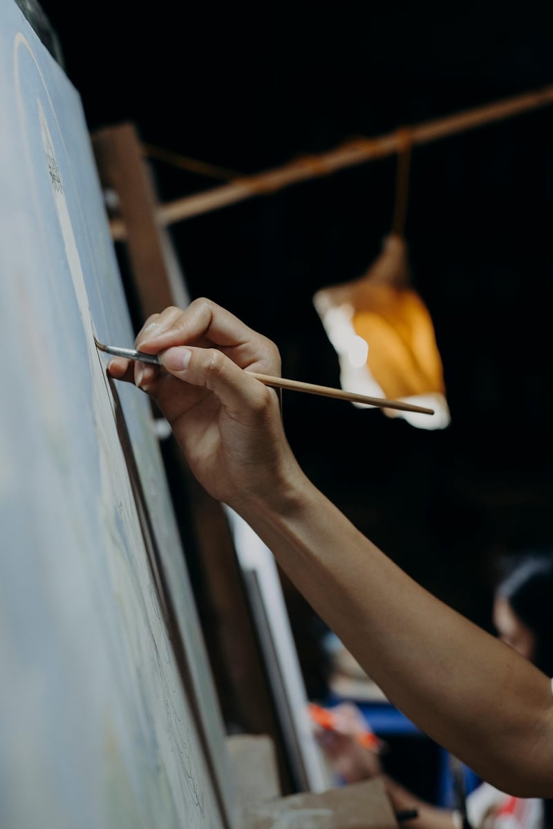 Artist painting on canvas